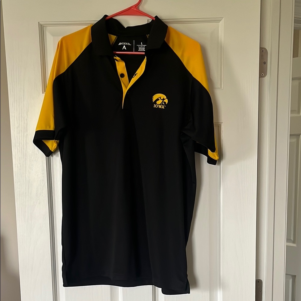 Antigua Black and Yellow Iowa Hawkeyes Polo Shirt